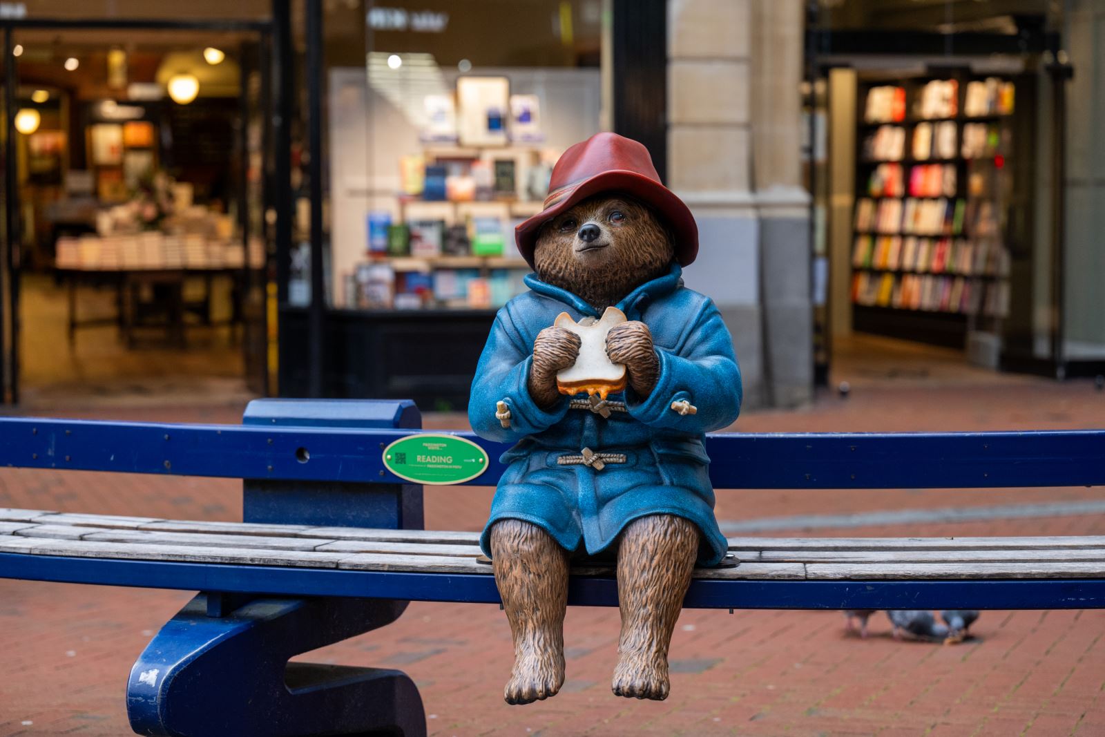 Paddington Statue on bench outside of Waterstones